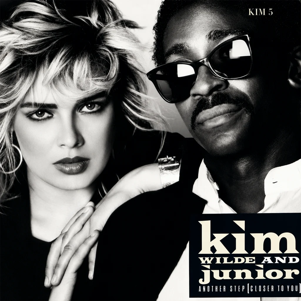 Kim Wilde & Junior – Another Step (Closer To You) Kim Wilde & Junior - Another Step (Closer To You) - UK 7'' Cover - Front